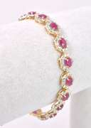Elegant 7.99CTW Ruby and 1.42CTW Diamond Braceled in Gold Plated Sterling Silver