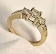 Pretty 3 Princess Cut Diamond Ring