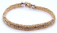 Dynamic Yellow Gold Byzantine Bracelet with Diamond accents