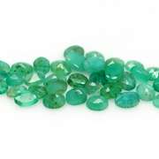 Rich emerald green 7.31ct 36pc emerald set