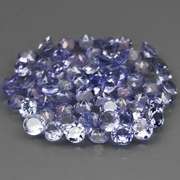 Heavy flashing 4.79ct diamond cut Tanzanite set