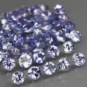 Heavy flashing 4.79ct diamond cut Tanzanite set