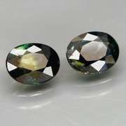 Excellent 1.49ct matched pair of blue green Sapphires