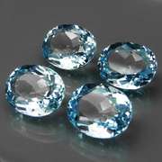 Large 17.66ct vivid sky blue Topaz set