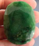 Heavy 329ct oval cut forest green Emerald