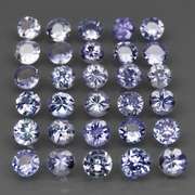 Glittering 5.61ct bright blue violet Tanzanite set