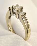 Pretty 3 Princess Cut Diamond Ring