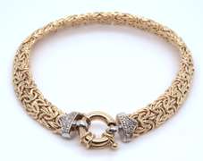 Dynamic Yellow Gold Byzantine Bracelet with Diamond accents