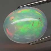 Remarkable 3.74ct rolling floral pattern Opal