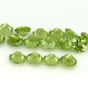 Dazzling 4.97ct untreated apple green Peridot set