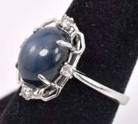 Darling 7.01CTS Cabochon-Cut Star Sapphire and 0.17CTW Diamond Ring in Sterling Silver