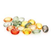 Glittering 7.85ct fancy color Sapphire set