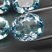 Large 18.71ct vivid sky blue Topaz set