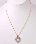 Stunning Diamond Heart Pendant Necklace in Yellow Gold