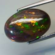 Magnificent 3.72ct disco flashing Black Opal