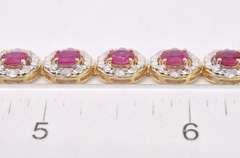 Elegant 7.99CTW Ruby and 1.42CTW Diamond Braceled in Gold Plated Sterling Silver