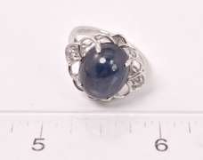 Sensational 11.11CTS Cabochon-Cut Star Sapphire & 0.08CTW Diamond Ring in Sterling Silver