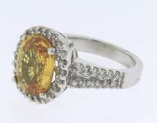 Remarkable White Gold oval Sapphire and Diamond Ring