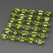 Dazzling 7.47ct untreated lime green Peridot set