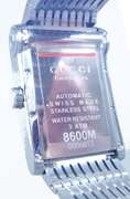 Gucci men's wristwatch 8600M Automatic Swiss Made NEW with tags box and papers