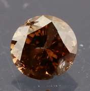 Eye catching 0.22ct smooth cut red Diamond solitaire