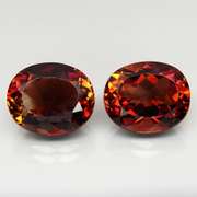 Coffee red! 12.28ct Imperial Topaz set