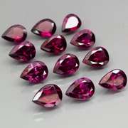 Amazing 9.54ct pear cut purple Garnet set