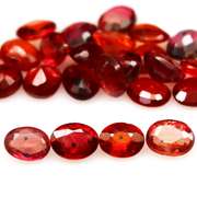 Excellent 6.22ct set of oval cut red Imperial Sapphires