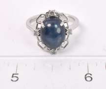 Darling 7.01CTS Cabochon-Cut Star Sapphire and 0.17CTW Diamond Ring in Sterling Silver