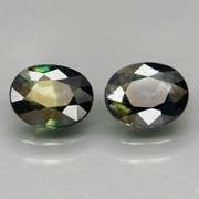 Excellent 1.49ct matched pair of blue green Sapphires