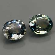 Heated only 1.37ct blue green glittering Sapphire set