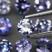 Glittering 5.34ct bright blue violet Tanzanite set