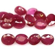 Vibrant 7.04ct oval cut imperial red Ruby set