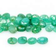 Rich emerald green 7.31ct 36pc emerald set