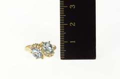 10K Yellow Gold Wavy Blue Topaz Diamond Accent Bypass Ring