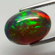 Full cover flashing! 3.66ct honeycomb Black Opal