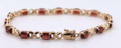 Attractive 7ctw Oval Garnet Yellow Gold Bracelet