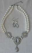 An Eye Catching Imitation Pearl Necklace and Earrings Set