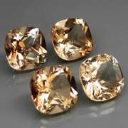 Gorgeous cushion cut 14.81ct Imperial Topaz set