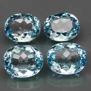 Large 18.71ct vivid sky blue Topaz set
