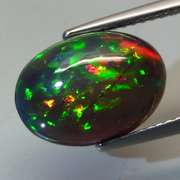 Full cover flashing! 3.66ct honeycomb Black Opal