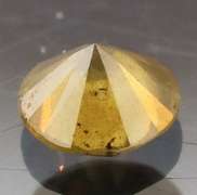 Eye catching 0.41ct golden orange Diamond solitaire