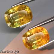 True bi-color 4.13ct Sphene with rainbow sparks