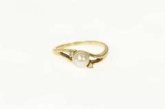10K Yellow Gold Pearl Diamond Accent Three Stone Bypass Ring