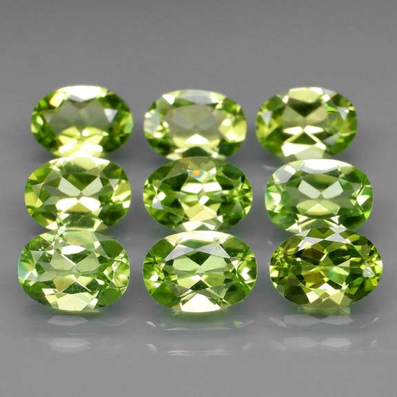 Awesome 7.26ct untreated apple green Peridot set