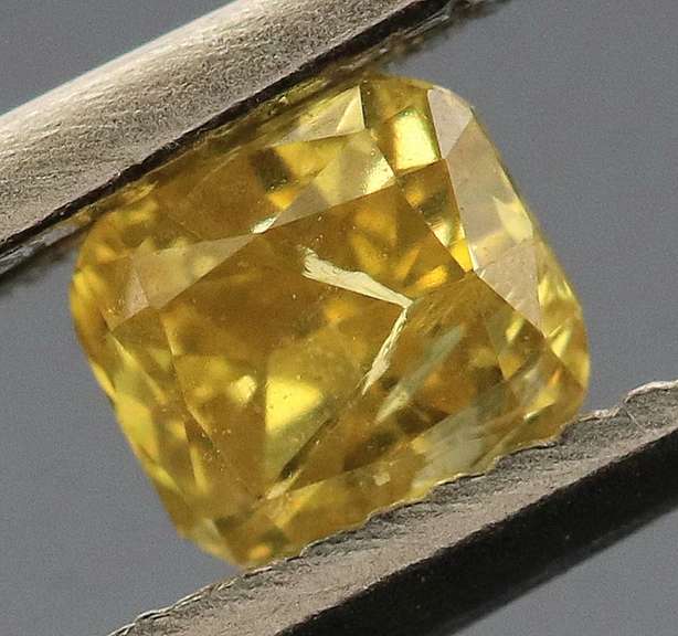Eye catching .23ct cushion cut golden Diamond
