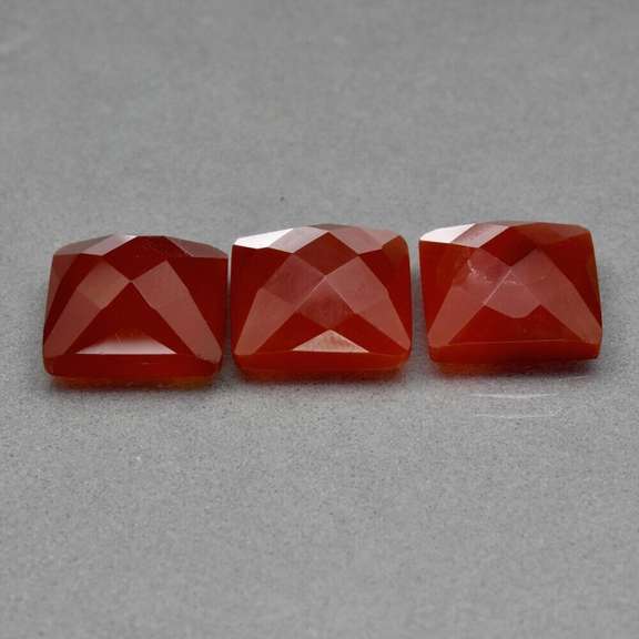 Glowing 23.10ct untreated blood orange Chalcedony set
