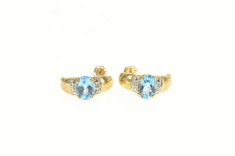 10K Yellow Gold Oval Blue Topaz Diamond Accent Curved Earrings