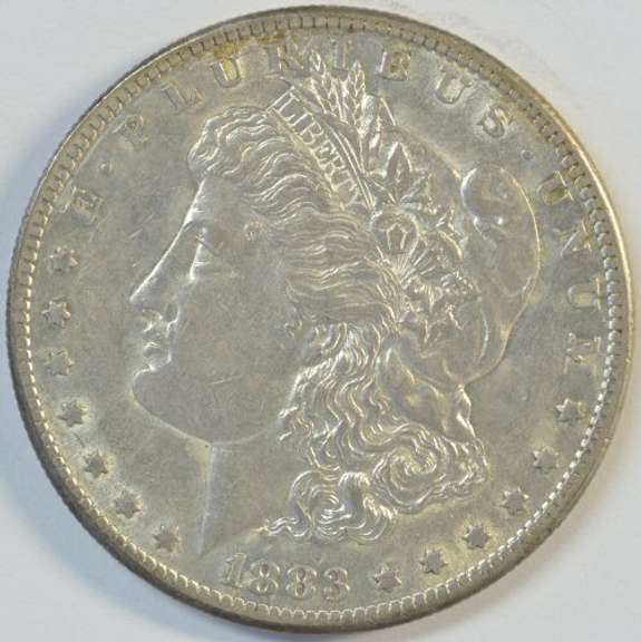 Lovely lustrous AU 1883-S Morgan Silver Dollar. Key date