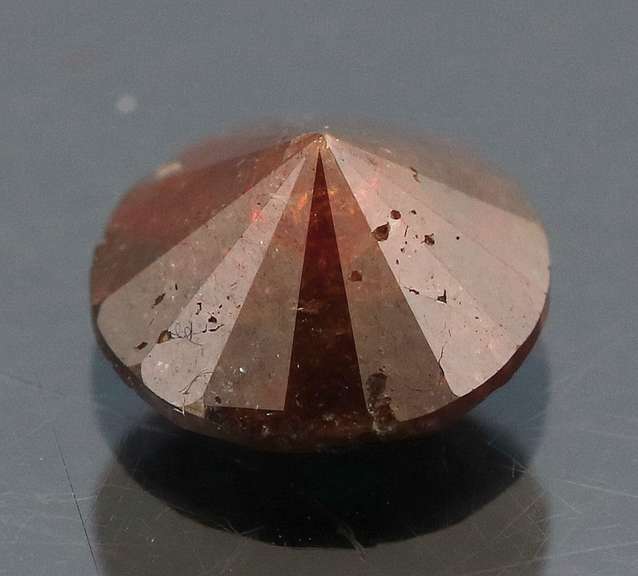 Eye catching 1.18ct round cut red Diamond solitaire